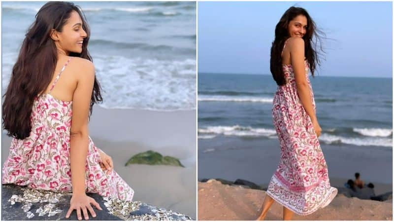 Andrea jeremiah warming up on the beach ...