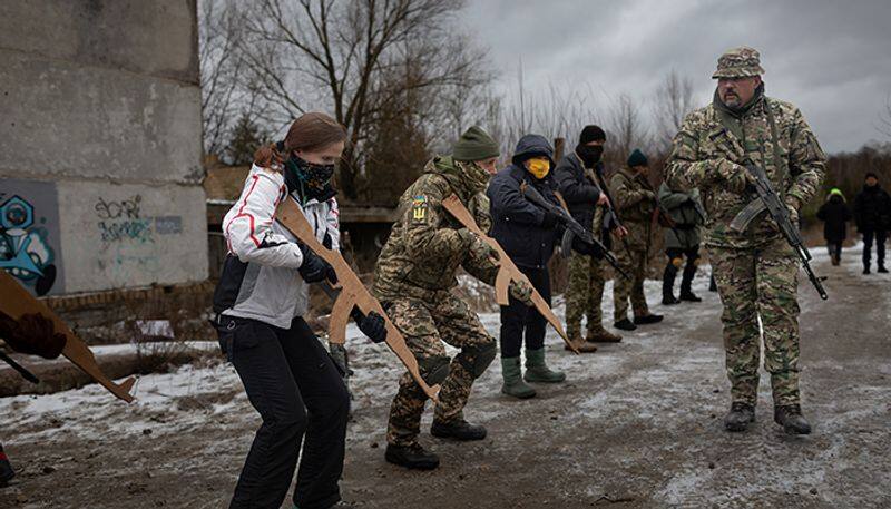 Russia Ukraine conflict Amid fears of Russian invasion Ukrainians train with wooden assault rifles in bizarre defence exercise