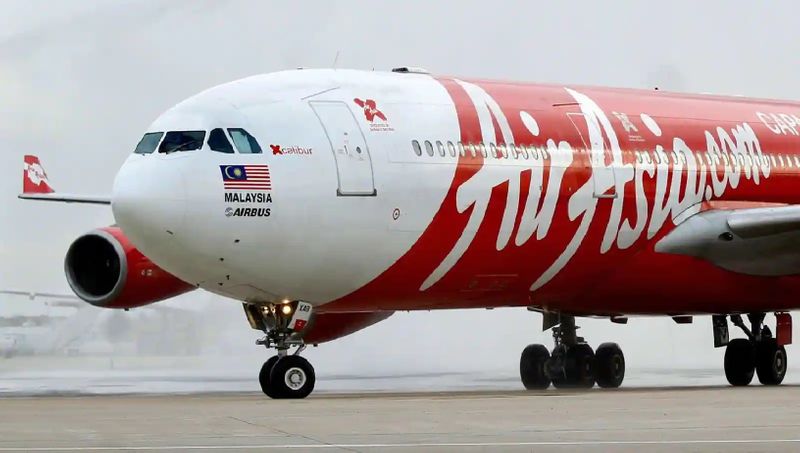 AirAsia sells its remaining equity shares in India operations to Tata-led Air India AJR