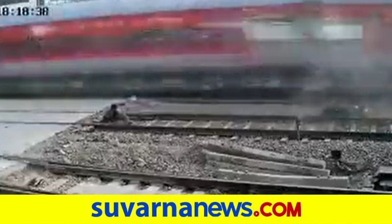 Man great escape from death as Speeding Rajdhani Train Crushes His Bike In Mumbai akb