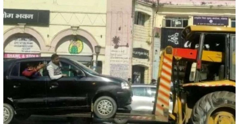 Car parked in no parking zone towed by officials despite passengers in it