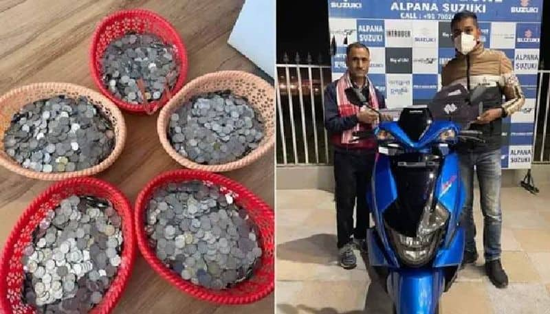 This man buys scooter with sack full of coins