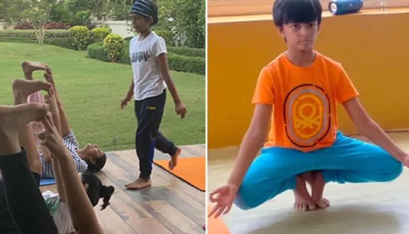 nine year old indian boy becomes worlds youngest yoga trainer