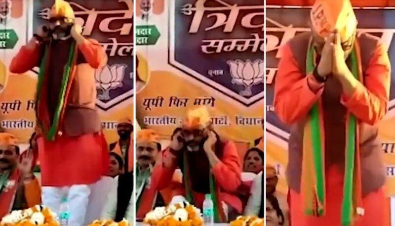 UP Election 2022 Robertsganj BJP MLA abruptly starts doing sit ups during rally Watch gcw