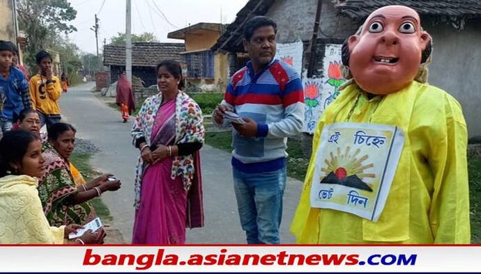 নির্দল প্রার্থীর ভোটের প্রচারে খোদ 'গোপাল ভাঁড়' ! একহাতে ইলিশ অন্য হাতে রয়েছে মিষ্টির হাঁড়ি