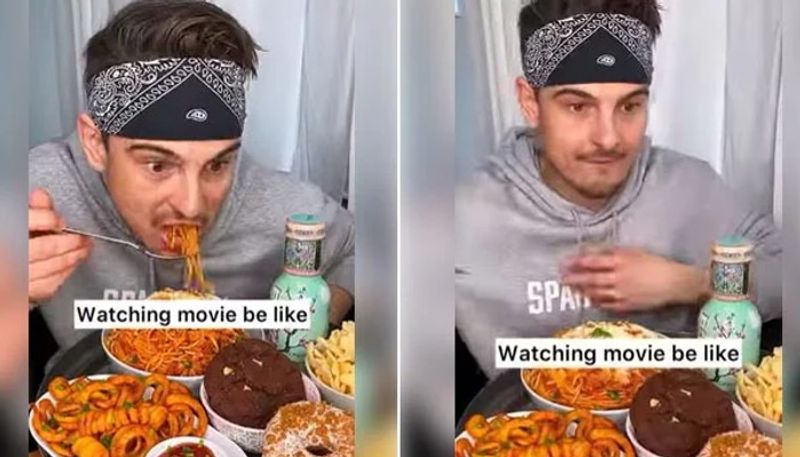 video in which man completes his meals before the movie starts