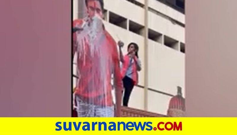 Tollywood Lady fan anointed with milk for Pawan kalyan bheemla nayank cutout vcs