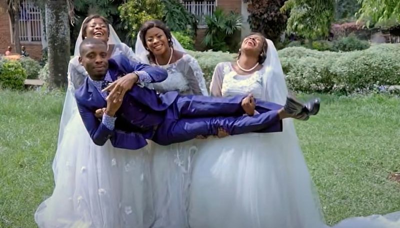 man marries triplets after they propose to him