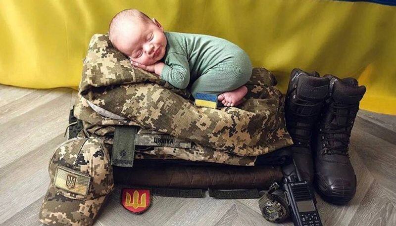 Goodbye my little boy Photo of baby sleeping on Ukrainian army uniform breaks the Internet