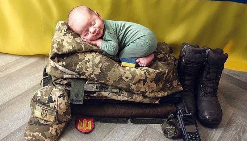 Goodbye my little boy Photo of baby sleeping on Ukrainian army uniform breaks the Internet