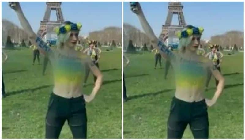 women in Paris go topless to protest against Vladimir Putin