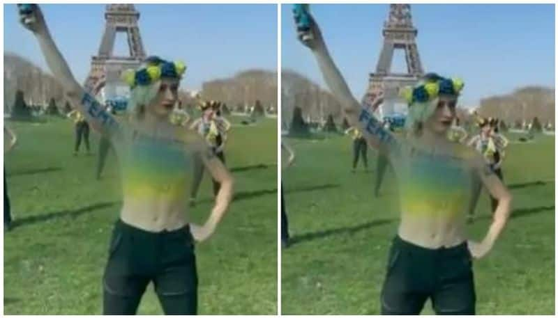 women in Paris go topless to protest against Vladimir Putin