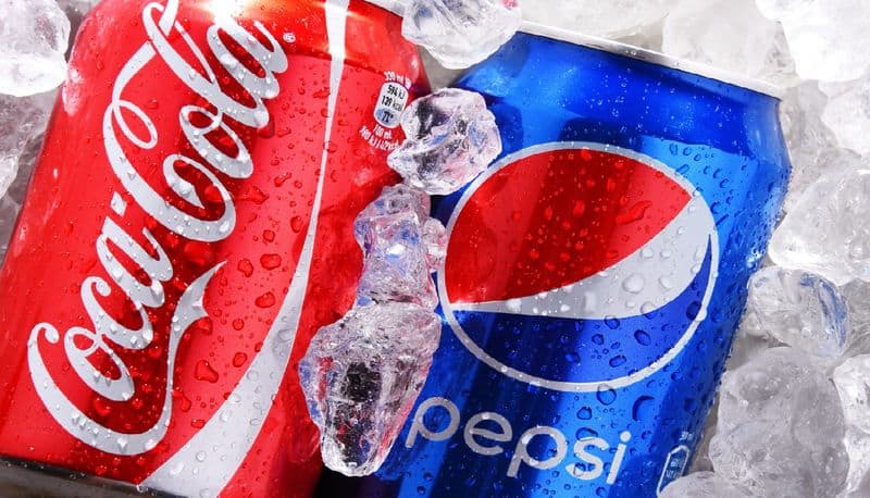 coke and pepsi suspended their business in russia