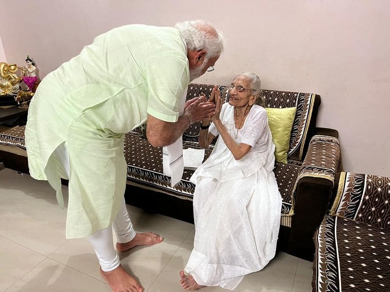 prime minister narendra modi who is on a two day visit to gujarat met his mother heeraben modi at her residence san