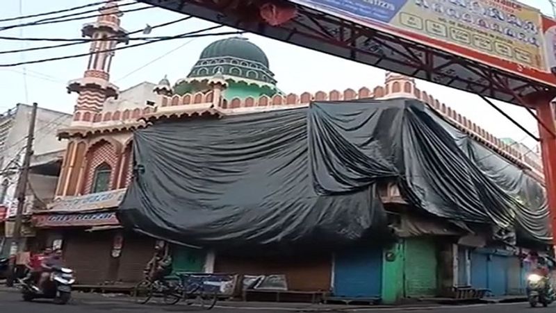 Aligarh mosque covered with tarpaulin ahead of Holi celebration Uttar Pradesh ckm