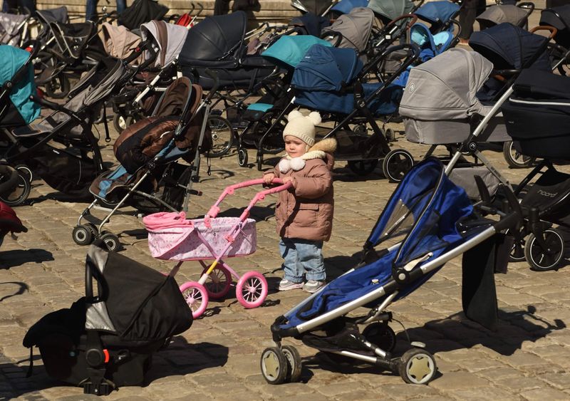 In Ukraine, empty strollers are a symbol of children killed in war