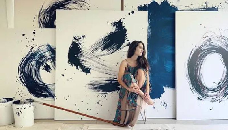 artist who paints with mop