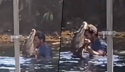 Watch: Man's grooves with an Alligator; stuns netizens