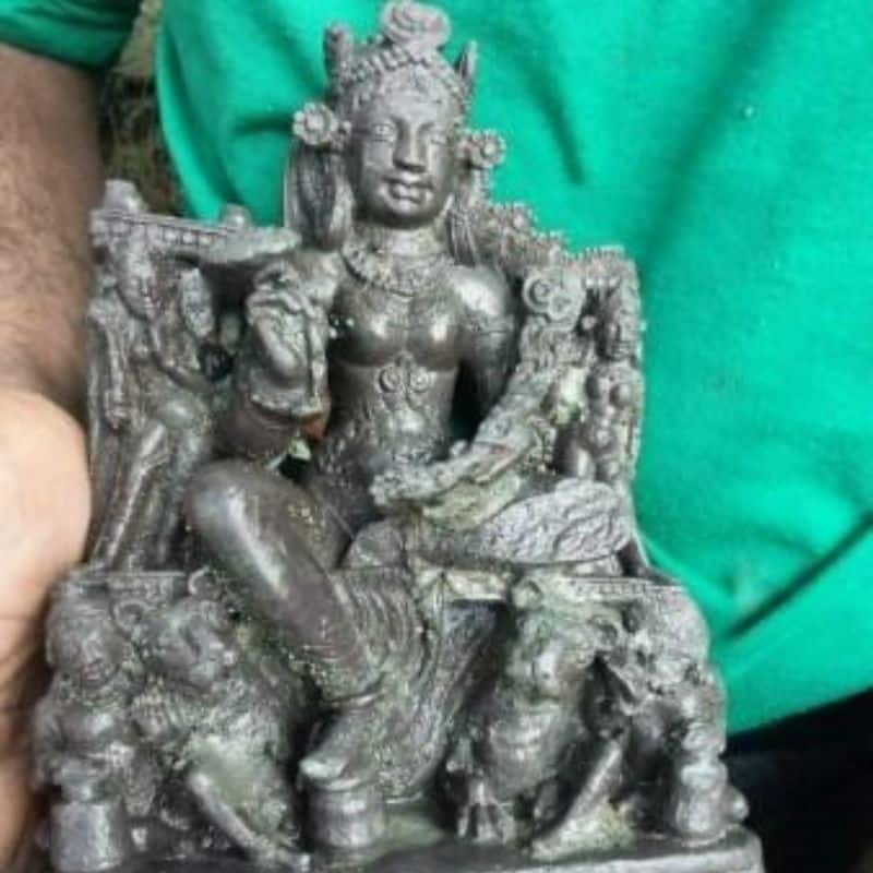 Three headed ancient sculpture of Lord Vishnu recovered from river Jhelum at Jammu and Kashmir