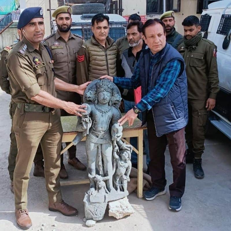 Three headed ancient sculpture of Lord Vishnu recovered from river Jhelum at Jammu and Kashmir