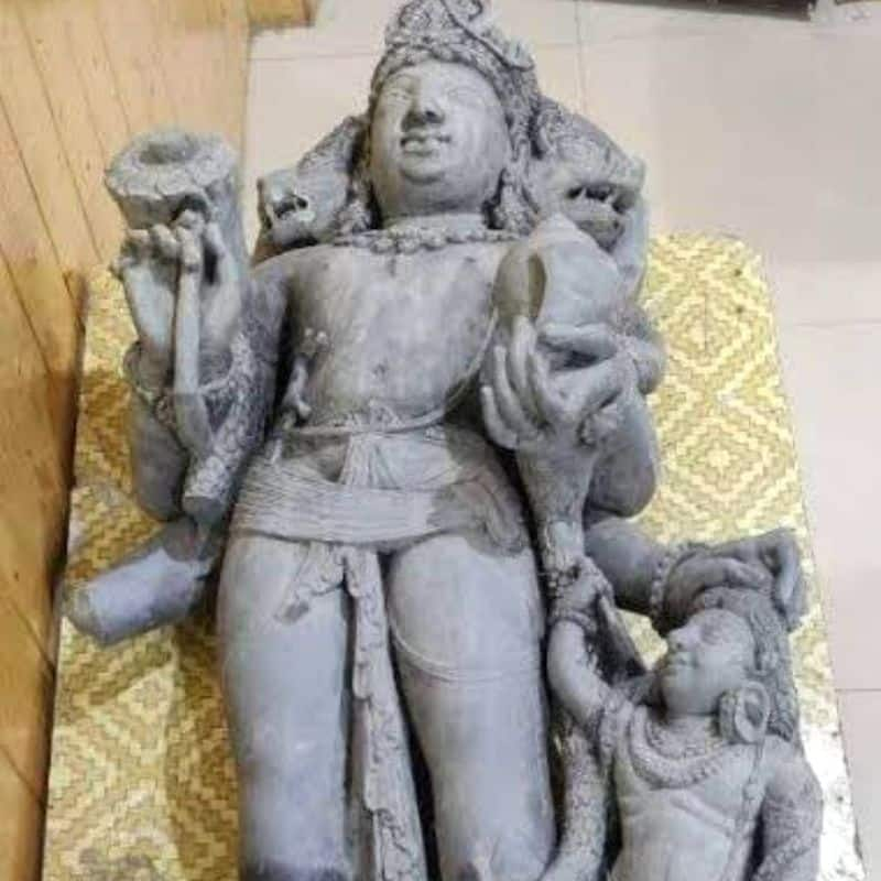 Three headed ancient sculpture of Lord Vishnu recovered from river Jhelum at Jammu and Kashmir