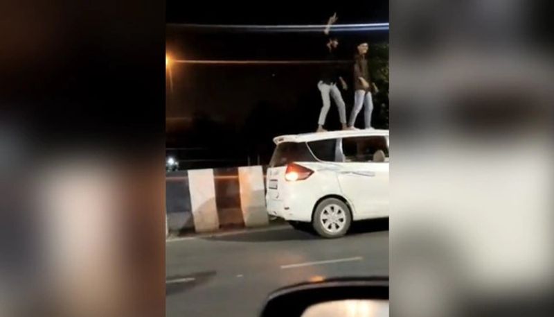 2 Men Dancing On Car Roof in Ghaziabad Traffic Police Slaps 20000 Fine