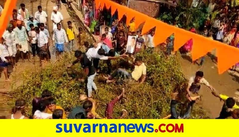 A special celebration of koppal by devotees jumping over the heap of thorns rbj