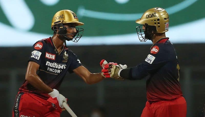 IPL 2022 Shahbaz Ahmed and Dinesh Karthik power hitting gave RCB thunder win over Rajasthan Royals