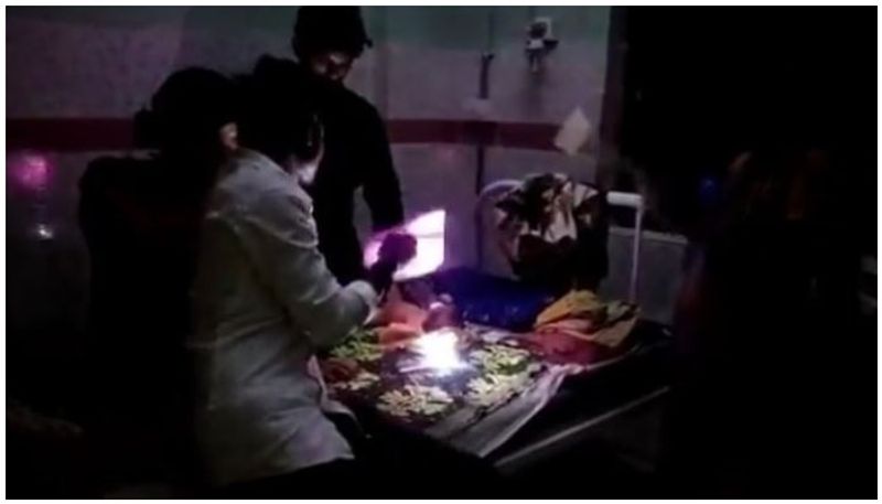 baby delivered using cellphone light and candles