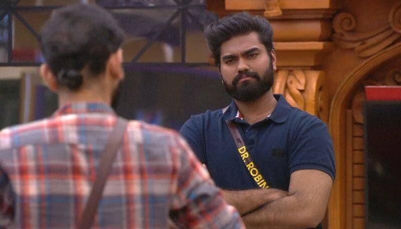 bigg boss malayalam season 4 akhil criticizes dr robin