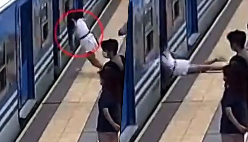 Spine-chilling video shows a woman fainting and falling under a train before; watch - gps