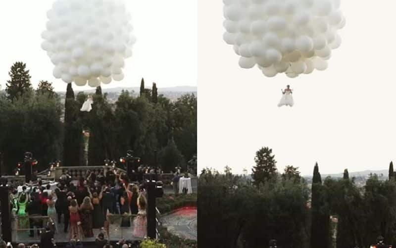 bride enters the wedding venue by flying and video goes viral