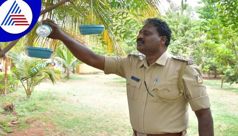 Police Inspector Provide Water to Birds During Summer in Koppal grg