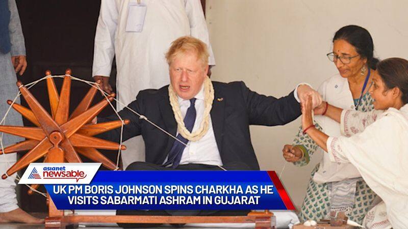 UK PM Boris Johnson spins charkha during his visit to Sabarmati Ashram in Gujarat watch gcw