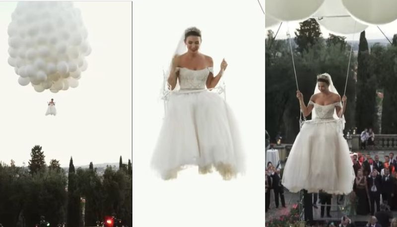 Bride floats to her wedding venue with 250 helium balloons