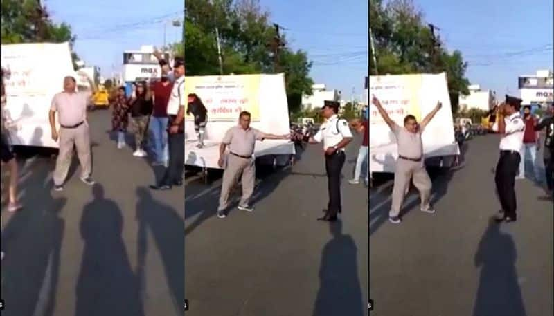 man and traffic cop dancing to Janu Meri Jaan on the street video goes viral