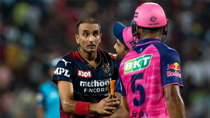 IPL 2022 RCB and RR Match Riyan Parag Harshal Patel fiery exchange refuesd to shake hands san 