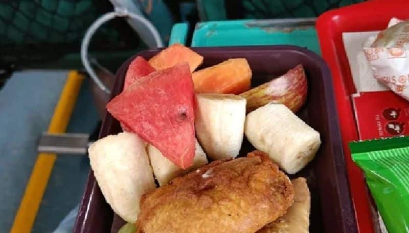 train passenger gets iftar meals from pantry staff