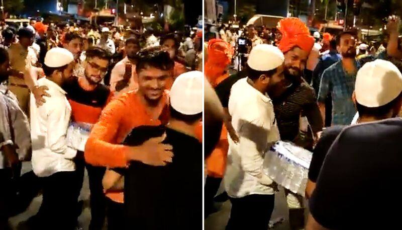 Watch Muslim men offer water bottles to devotees of Hindu procession in Mumbai; win hearts-tgy