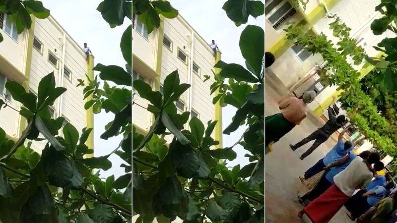 Theni Government Medical College Hospital was disturbed by a disabled employee who made a suicide threat while standing on the fourth floor of the building