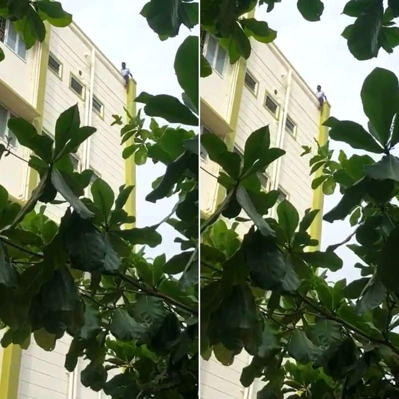 Theni Government Medical College Hospital was disturbed by a disabled employee who made a suicide threat while standing on the fourth floor of the building