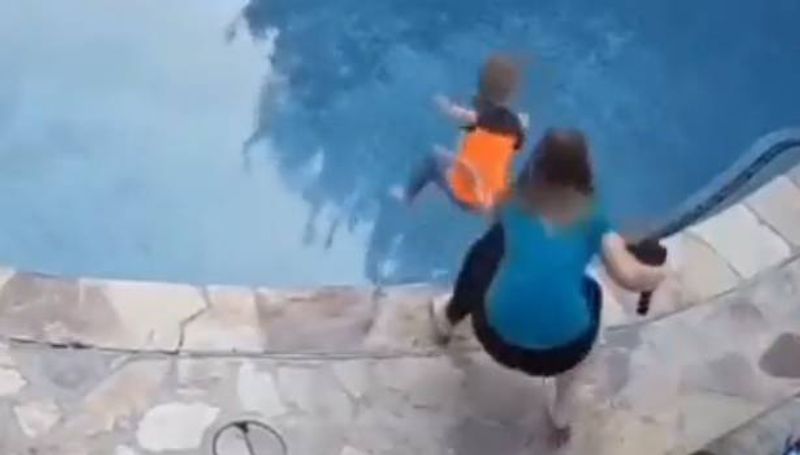 Mother Of The Year Catches Son Just In Time Saves Him From Drowning In Swimming Pool