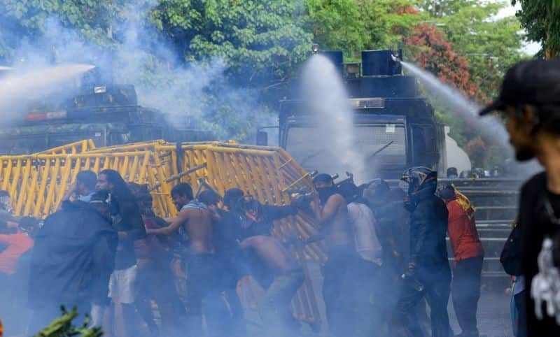 Bahubali Bhallaladeva statue broke model at Angry protesters pull down a statue of DA Rajapaksa father of Rajapaksa brothers