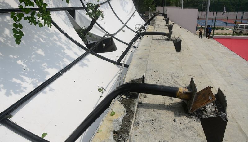 atal bihari vajpayee stadium gallery collapse over rain and wind in bengaluru gvd