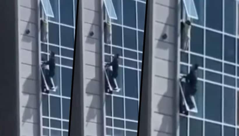 WATCH: Man climbs to the window of 8th floor to save a child