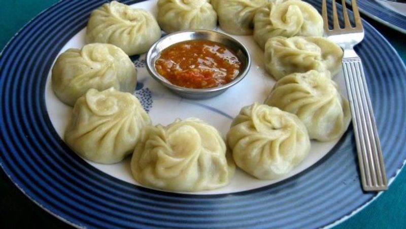 women dies more than 60 hospitalized after eating momos Banjara Hills area