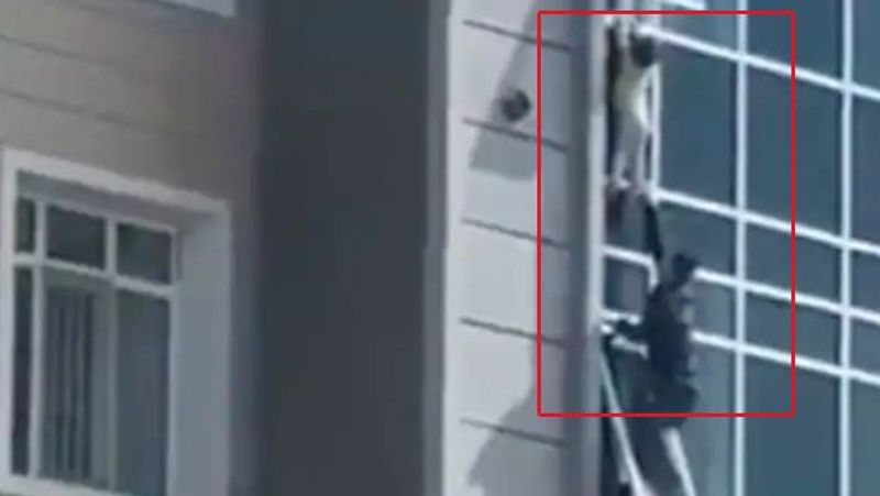 Caught On Camera Man Risks Life To Save Toddler Hanging From Eighth Floor Window