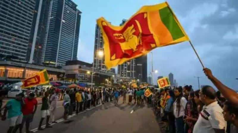 Sri Lanka amends the constitution to limit the President's powers.