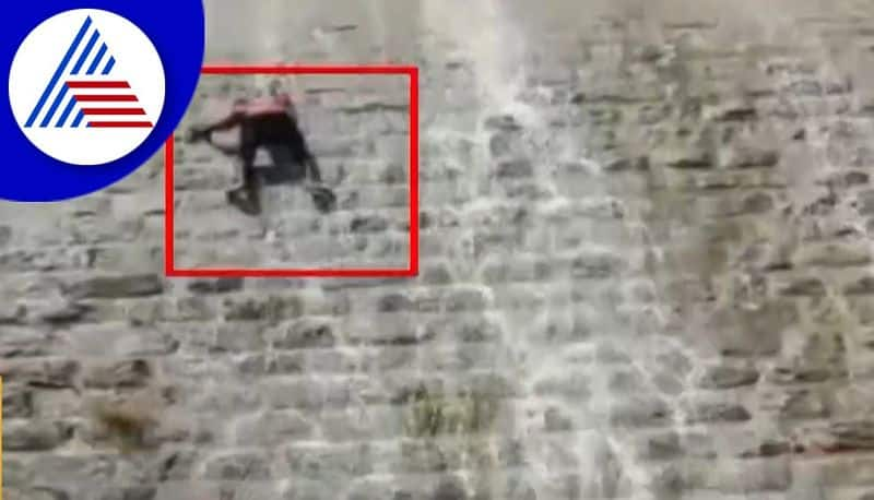 chikkaballapura yoth trying to climb srinivasa sagara falls and fell down video goes viral akb