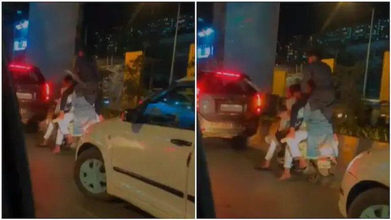 6 people seen riding on a scooter in bizarre viral video shared on Twitter. Mumbai Traffic Police responds